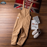 Cream Dungaree Romper with Cuffeed Hem